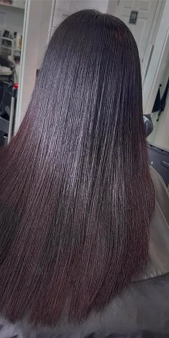 Smooth sleek hair after Nanoplastia treatment at Stylin'Chic