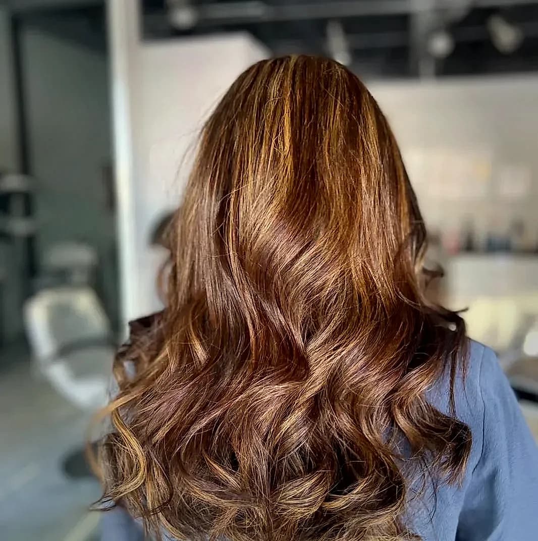 Brown balayage with bouncy curls styling